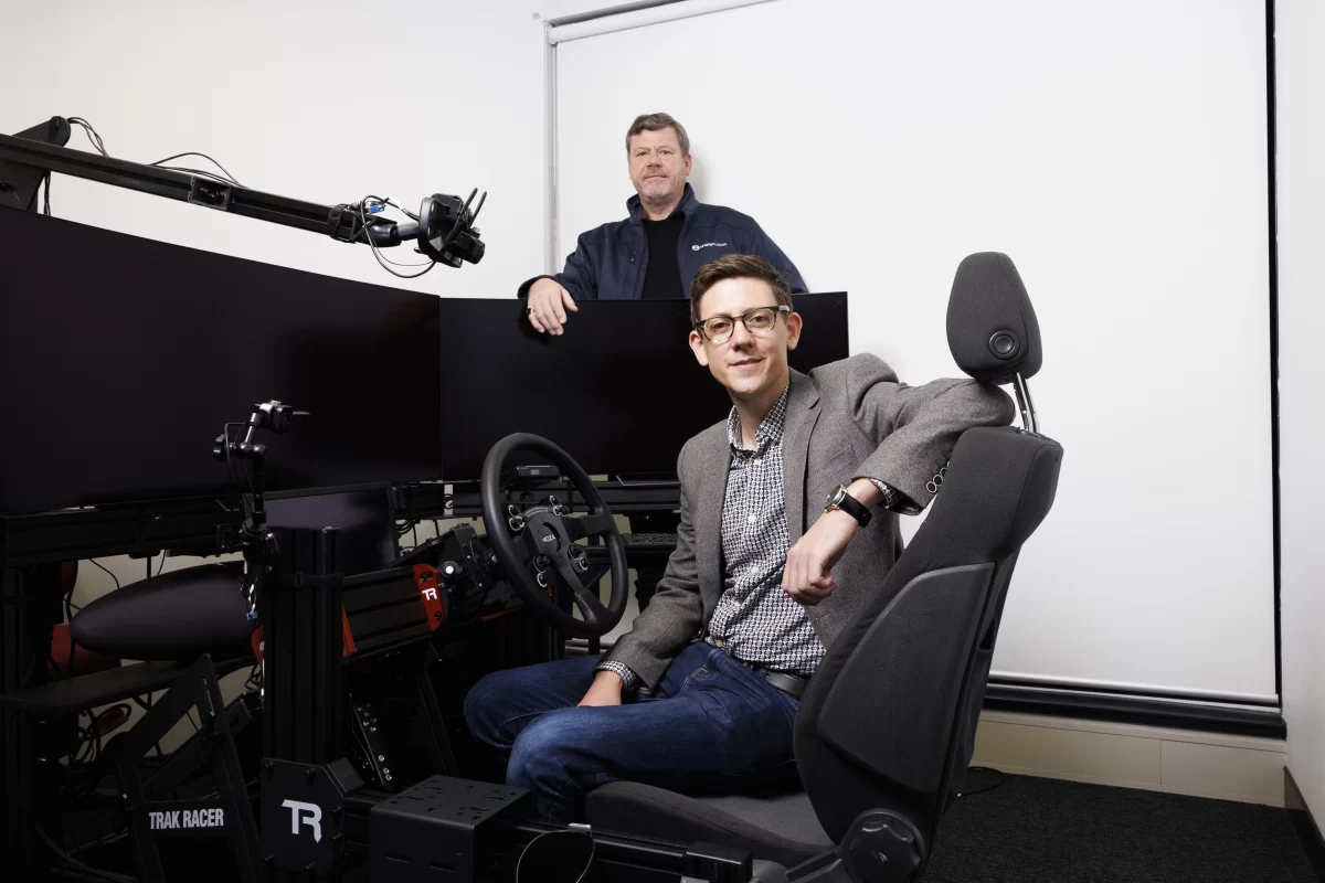Seeing Machines chief executive officer, Paul McGlone, left, and the company's head of innovation John Noble inside one of the driving labs. Photo credit - Keegan Carroll, The Canberra Times